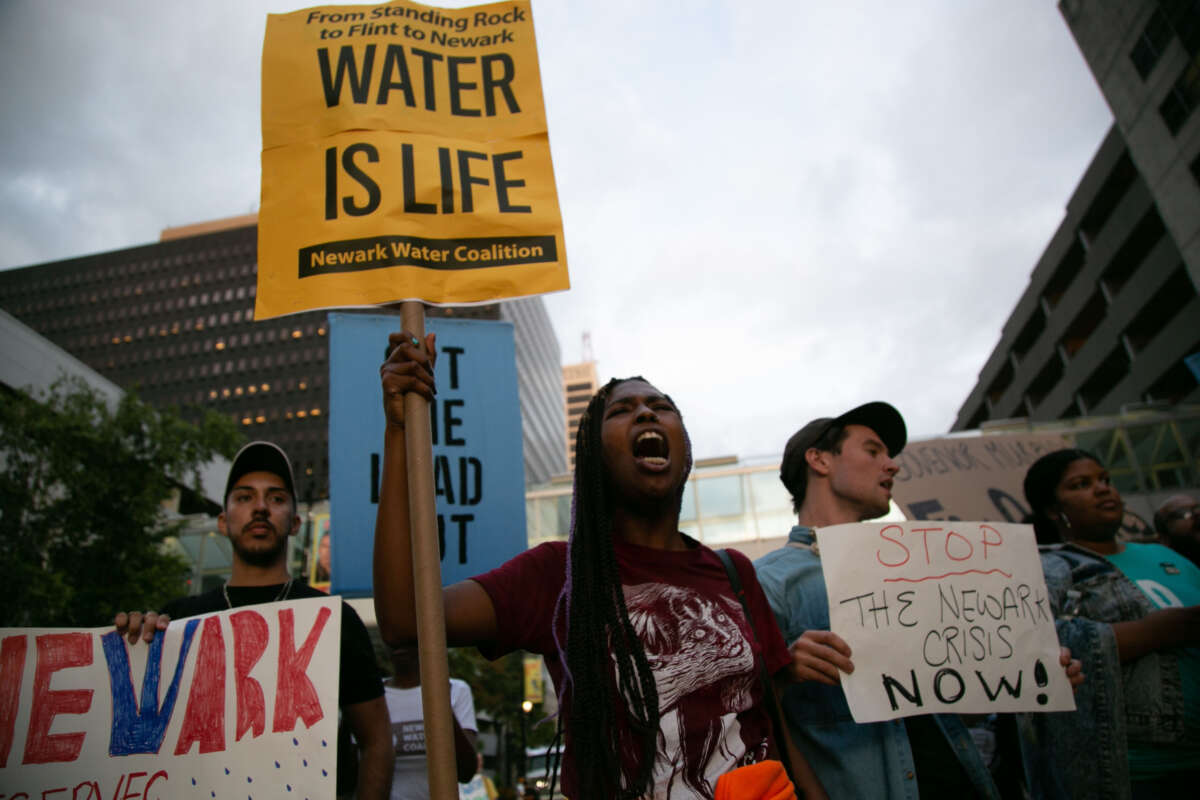 Protesters march during the MTV Video and Music Awards to bring attention to the water crisis gripping the city, outside the Prudential Center in Newark, New Jersey, on August 26, 2019.