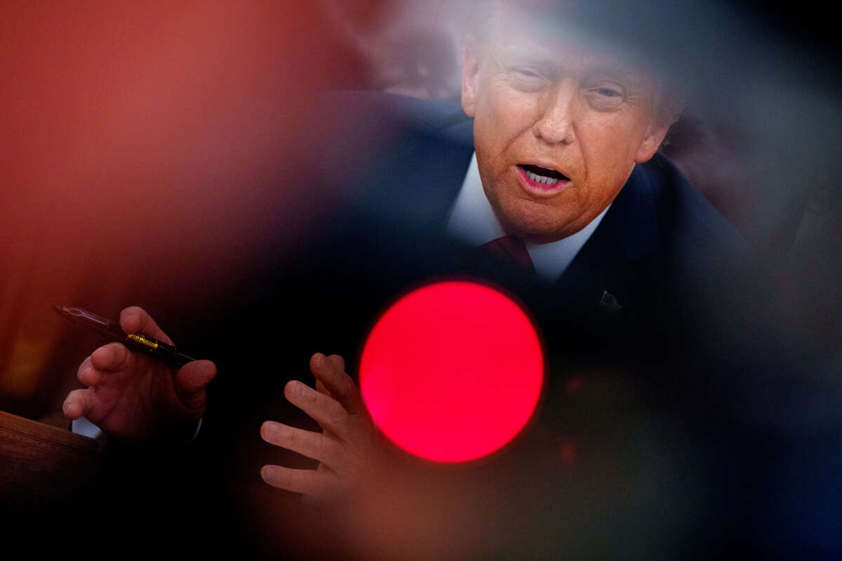 President Donald Trump speaks as he signs a series of executive orders in the Oval Office at the White House on February 10, 2025, in Washington, D.C.