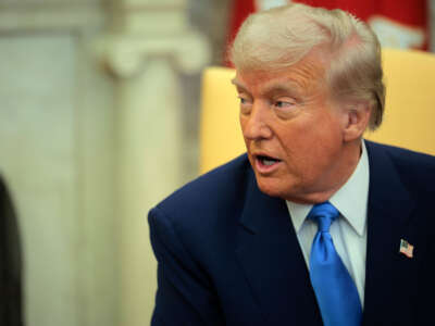 President Donald Trump speaks during a meeting with French President Emmanuel Macron in the Oval Office at the White House on February 24, 2025, in Washington, D.C.