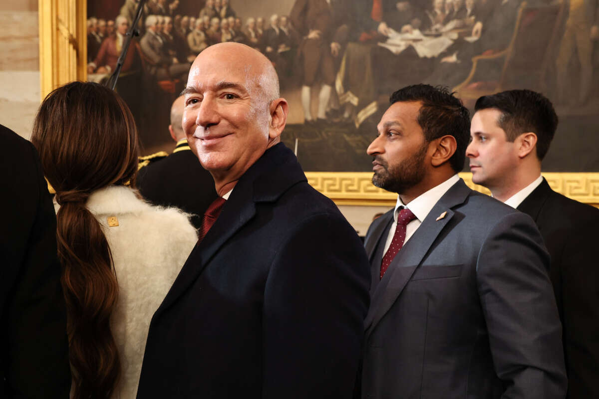 Founder of Amazon and Blue Origin Jeff Bezos and Kash Patel, President Trump's nominee for FBI Director, depart inauguration ceremonies in the Rotunda of the U.S. Capitol on January 20, 2025, in Washington, D.C.