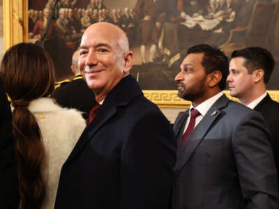 Founder of Amazon and Blue Origin Jeff Bezos and Kash Patel, President Trump's nominee for FBI Director, depart inauguration ceremonies in the Rotunda of the U.S. Capitol on January 20, 2025, in Washington, D.C.