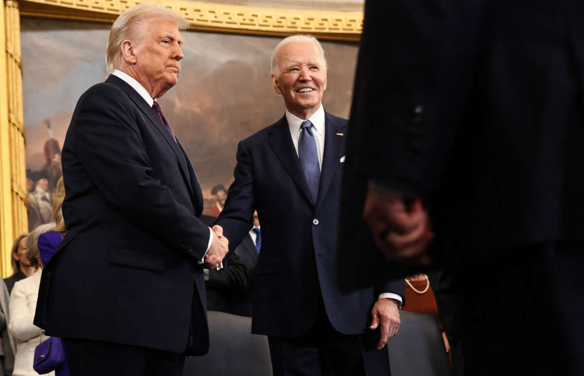 President-elect Donald Trump greets President Joe Biden as he arrives for inauguration ceremonies in the Rotunda of the U.S. Capitol on January 20, 2025, in Washington, D.C.