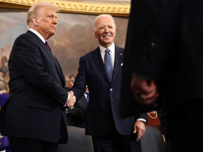 President-elect Donald Trump greets President Joe Biden as he arrives for inauguration ceremonies in the Rotunda of the U.S. Capitol on January 20, 2025, in Washington, D.C.