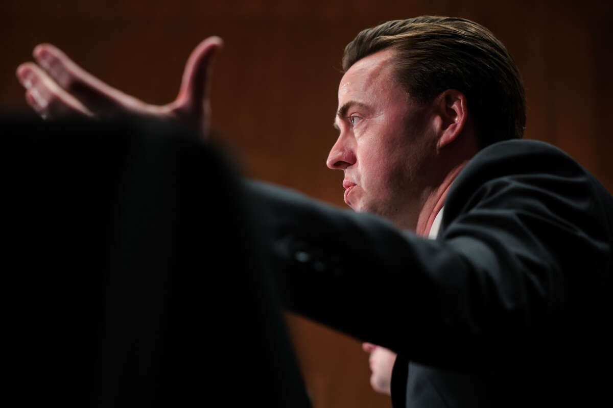 Jonathan McKernan, nominee for director of the Consumer Financial Protection Bureau, testifies at a hearing of the Senate Banking Committee on February 27, 2025, at the Dirksen Senate Building in Washington, D.C.