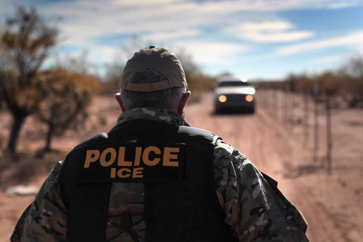 U.S. Special Agent Rodney Irby waits for backup agents while searching for smuggled marijuana on January 18, 2011, in the Tohono O'odham Nation, Arizona.