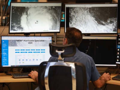 A hurricane specialist works on tracking Hurricane Beryl at the National Hurricane Center on July 1, 2024 in Miami, Florida.