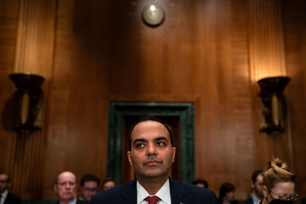 Consumer Financial Protection Bureau (CFPB) Director Rohit Chopra arrives to testify before a Senate Banking, Housing, and Urban Affairs Committee hearing on Capitol Hill on December 11, 2024, in Washington, D.C.