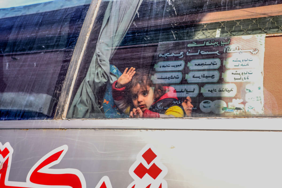 A Palestinian child pictured inside a bus before departing Gaza for Egypt to receive proper medical care, in Khan Yunis, Gaza, on February 2, 2025.