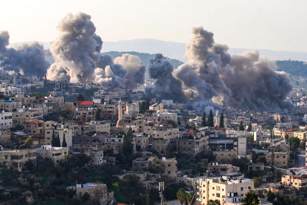 Smoke billows from the site of several explosions during an Israeli raid on the Jenin camp for Palestinian refugees on February 2, 2025.