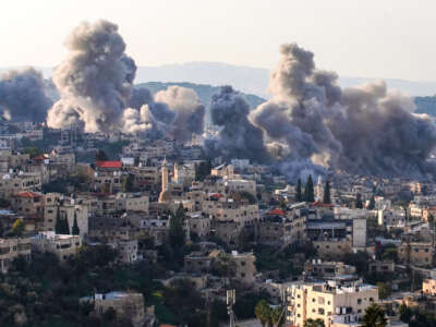 Smoke billows from the site of several explosions during an Israeli raid on the Jenin camp for Palestinian refugees on February 2, 2025.