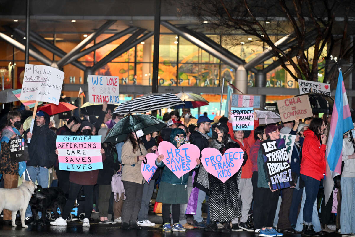 Supporters of transgender youth demonstrate outside Children's Hospital Los Angeles (CHLA) on February 6, 2025 in the wake of US President Donald Trump's executive order threatening to pull federal funding from healthcare providers who offer gender-affirming care to children.