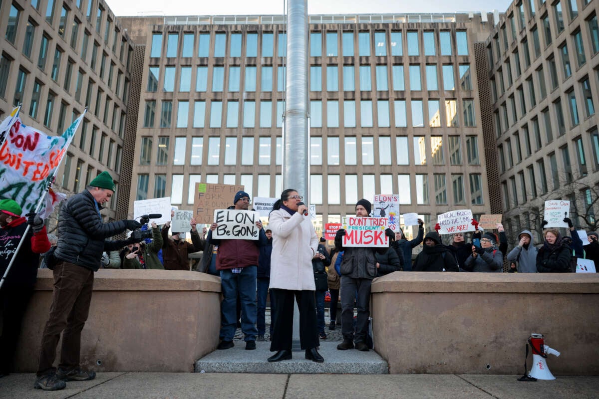 Rep. Rashida Tlaib speaks at a rally with federal workers and supporters as they protest against Elon Musk and his Department of Government Efficiency outside of the Office of Personnel Management headquarters on February 7, 2025 in Washington, D.C.