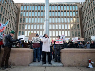 Rep. Rashida Tlaib speaks at a rally with federal workers and supporters as they protest against Elon Musk and his Department of Government Efficiency outside of the Office of Personnel Management headquarters on February 7, 2025 in Washington, D.C.