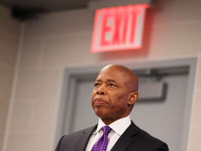 New York Mayor Eric Adams stands silently during a press conference at NYPD's 40th Precinct on February 20, 2025, in New York City.