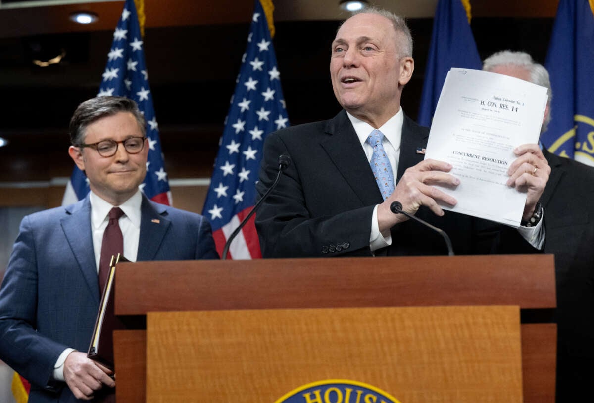 House Majority Leader Steve Scalise holds a copy of the House Republicans' budget bill during a press conference following the Republican Conference meeting, on Capitol Hill in Washington, D.C., on February 25, 2025.