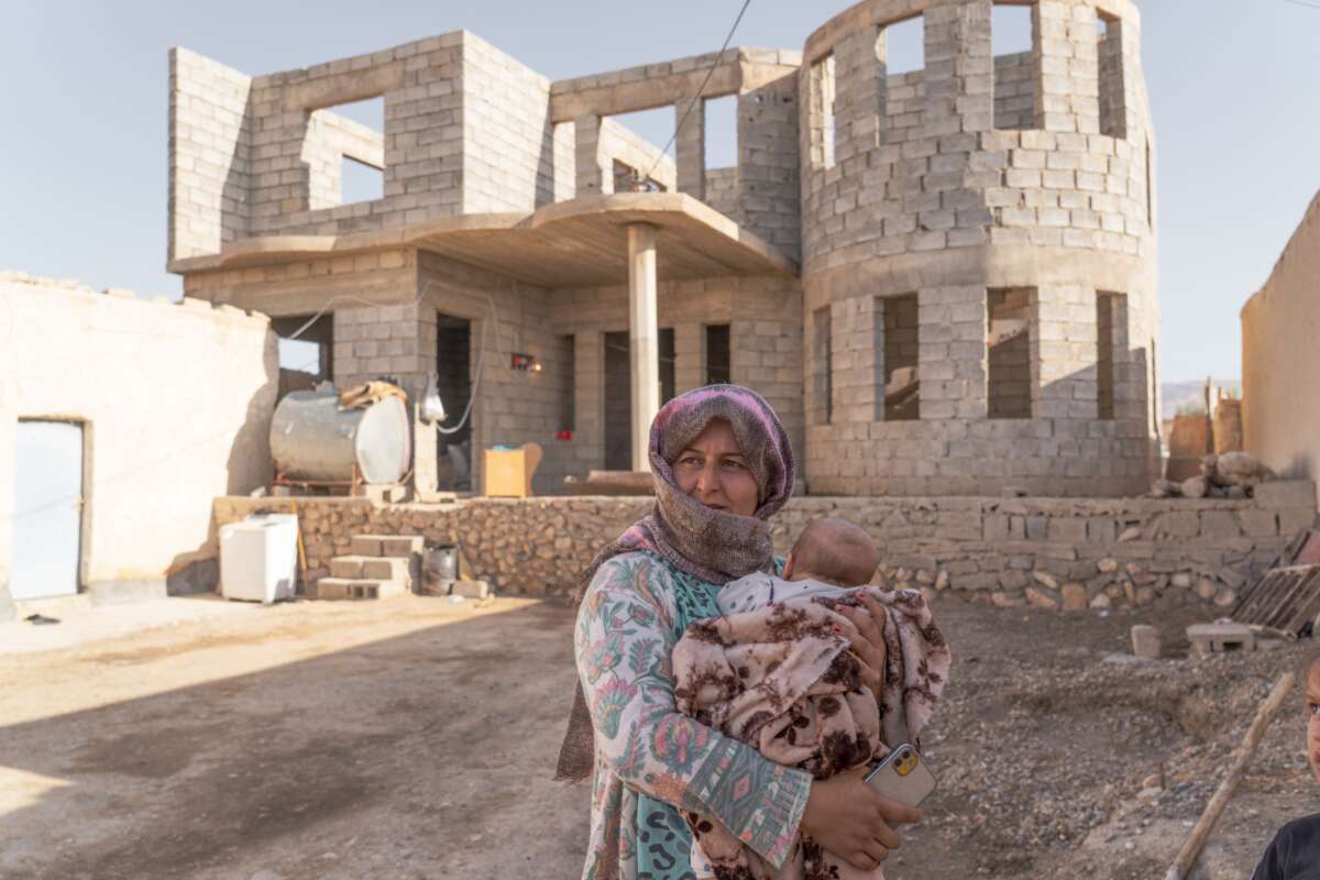 Sahar Hajimalo, 30,  just returned to Sinjar a few days ago and is sleeping on the floor of a half-constructed home. 