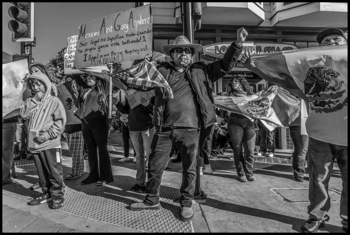 These photos capture protests against ICE and Trump’s threats of mass deportation in February 2025, in San Mateo and Fort Bragg, California.