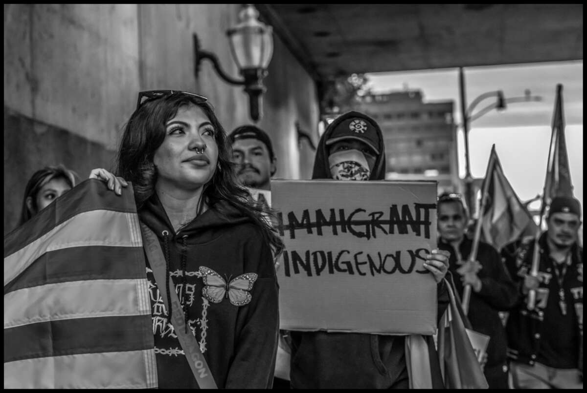 These photos capture protests against ICE and Trump’s threats of mass deportation in February 2025, in San Mateo and Fort Bragg, California.