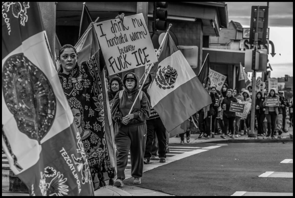 These photos capture protests against ICE and Trump’s threats of mass deportation in February 2025, in San Mateo and Fort Bragg, California.