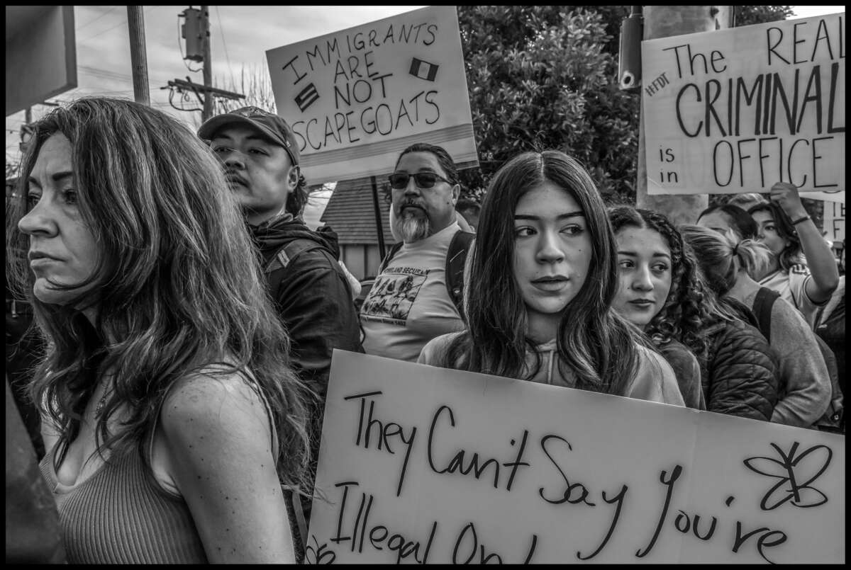 These photos capture protests against ICE and Trump’s threats of mass deportation in February 2025, in San Mateo and Fort Bragg, California.