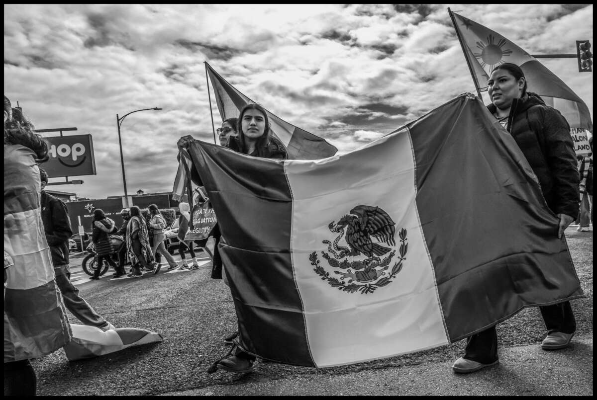 These photos capture protests against ICE and Trump’s threats of mass deportation in February 2025, in San Mateo and Fort Bragg, California.