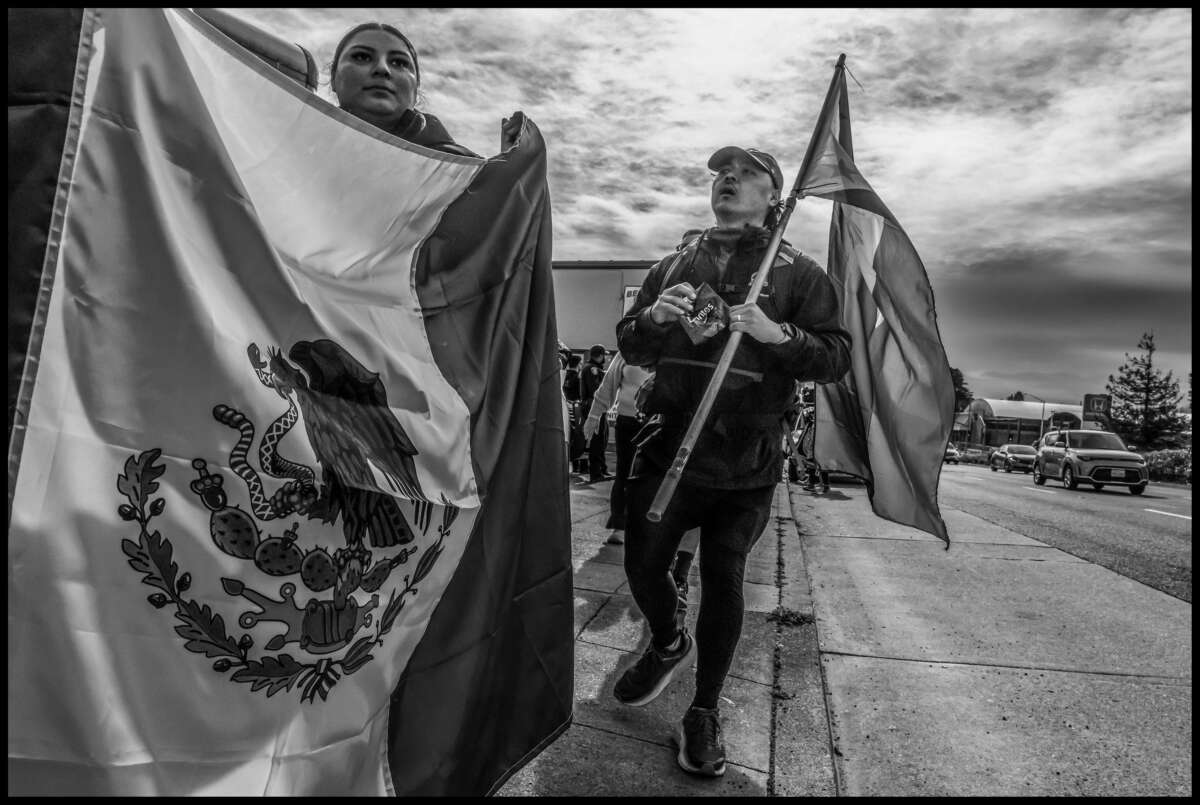 These photos capture protests against ICE and Trump’s threats of mass deportation in February 2025, in San Mateo and Fort Bragg, California.