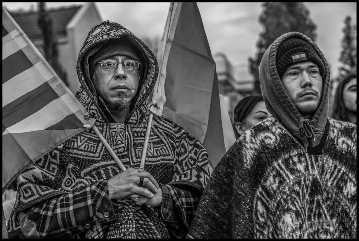 These photos capture protests against ICE and Trump’s threats of mass deportation in February 2025, in San Mateo and Fort Bragg, California.