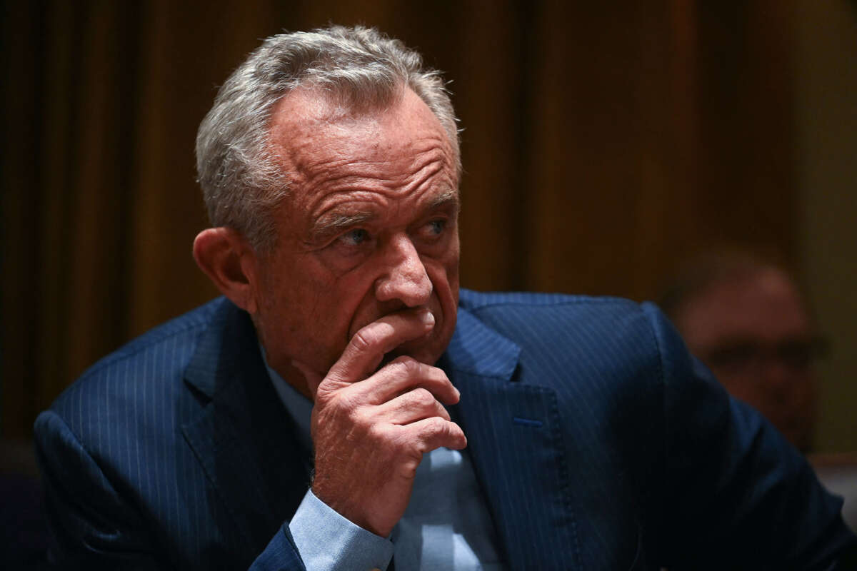 Secretary of Health and Human Services nominee Robert F. Kennedy Jr. listens as President Donald Trump holds a cabinet meeting at the White House in Washington, D.C., on February 26, 2025.