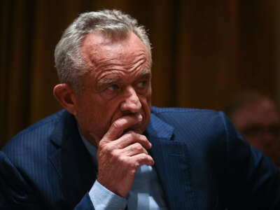 Secretary of Health and Human Services nominee Robert F. Kennedy Jr. listens as President Donald Trump holds a cabinet meeting at the White House in Washington, D.C., on February 26, 2025.