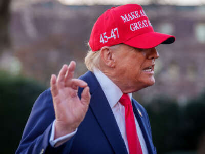 President Donald Trump speaks to members of the media before boarding Marine One on the South Lawn of the White House on February 28, 2025, in Washington, D.C.