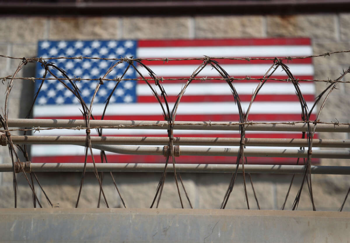 Razor wire lines the fence of the Guantánamo Bay maximum security detention center on October 22, 2016, at the U.S. Naval Station at Guantánamo Bay, Cuba.