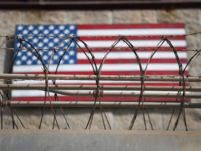 Razor wire lines the fence of the Guantánamo Bay maximum security detention center on October 22, 2016, at the U.S. Naval Station at Guantánamo Bay, Cuba.