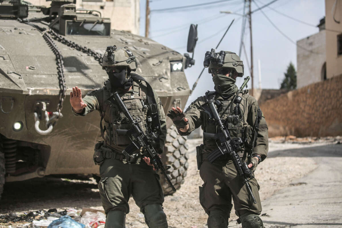 Israeli soldiers guard Eitan armored vehicles during a military operation in Nablus, Palestine, on March 4, 2025. The Israeli army killed two Palestinians in the eastern neighborhood of Jenin, using armored vehicles and drones in the operation, burned two houses, and destroyed another during the military operation.