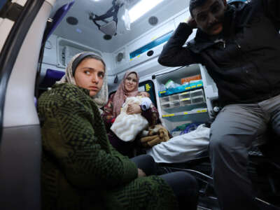 Children from Gaza, Palestine, arrive with their relatives at the King Hussein border crossing between Israel and Jordan on March 4, 2025, at South Shuna, Jordan.