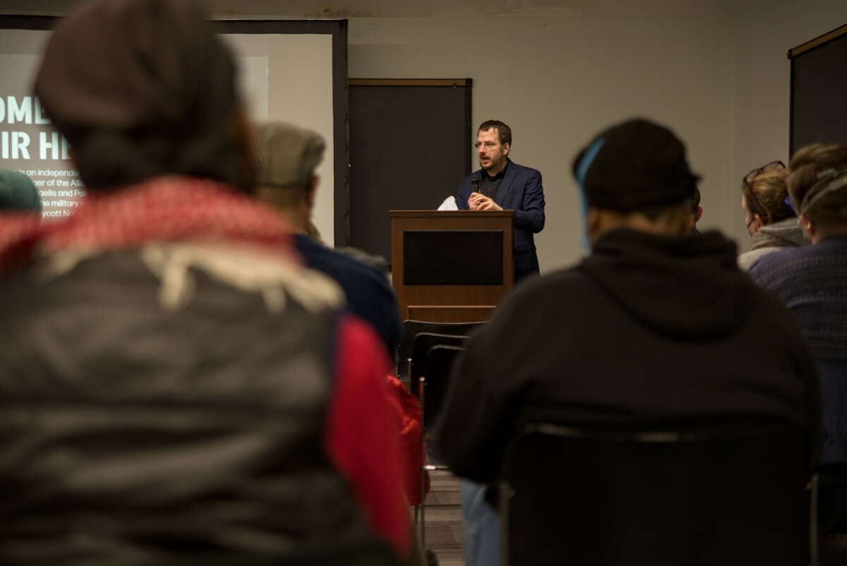 Shir Hever, a political economist coordinating the Boycott, Divestment, Sanctions movement's worldwide military embargo campaign from Berlin, addresses the St. Louis Palestinian Solidarity Committee (STL-PSC) on February 13. On the heels of their successful ceasefire resolution campaign in January 2024, STL-PSC is developing a municipal Ethical Procurement campaign to make sure taxpayer resources in St. Louis are deployed ethically.