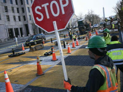 Crews begin work to remove the Black Lives Matter street mural and plaza in Washington, D.C., on March 10, 2025.