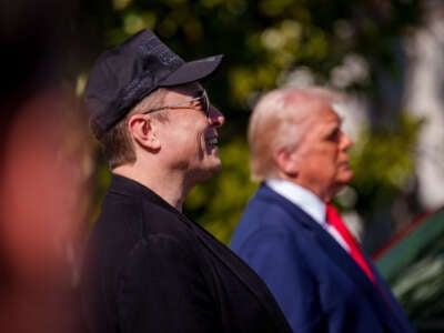 President Donald Trump and Elon Musk look at electric Tesla cars on the South Lawn of the White House on March 11, 2025, in Washington, D.C.