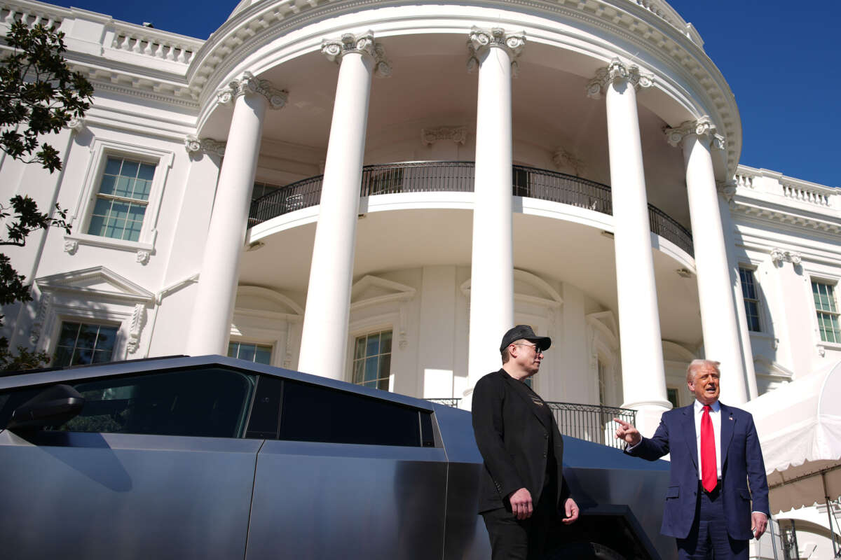 President Donald Trump and Elon Musk deliver remarks next to a Tesla Cybertruck on the South Lawn of the White House on March 11, 2025, in Washington, D.C.