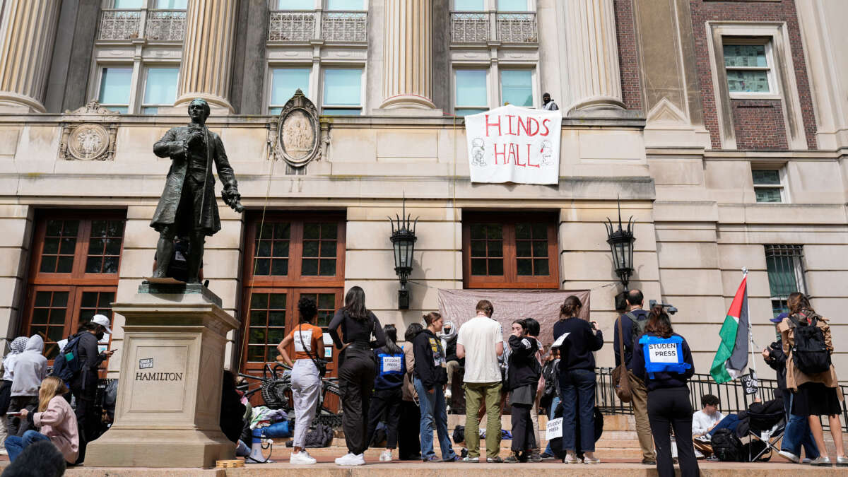 Pro-Palestinian student protesters gather on the front steps of Hamilton Hall at Columbia University in New York City, on April 30, 2024.