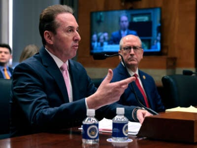 Troy Edgar (left), nominee to be the next Deputy Secretary of Homeland Security; and Rep. Dan Bishop, nominee to be the next Deputy Director of the Office of Management and Budget, testify during their confirmation hearing before the Senate Homeland Security and Governmental Affairs Committee in the Dirksen Senate Office Building on Capitol Hill on February 25, 2025, in Washington, D.C.