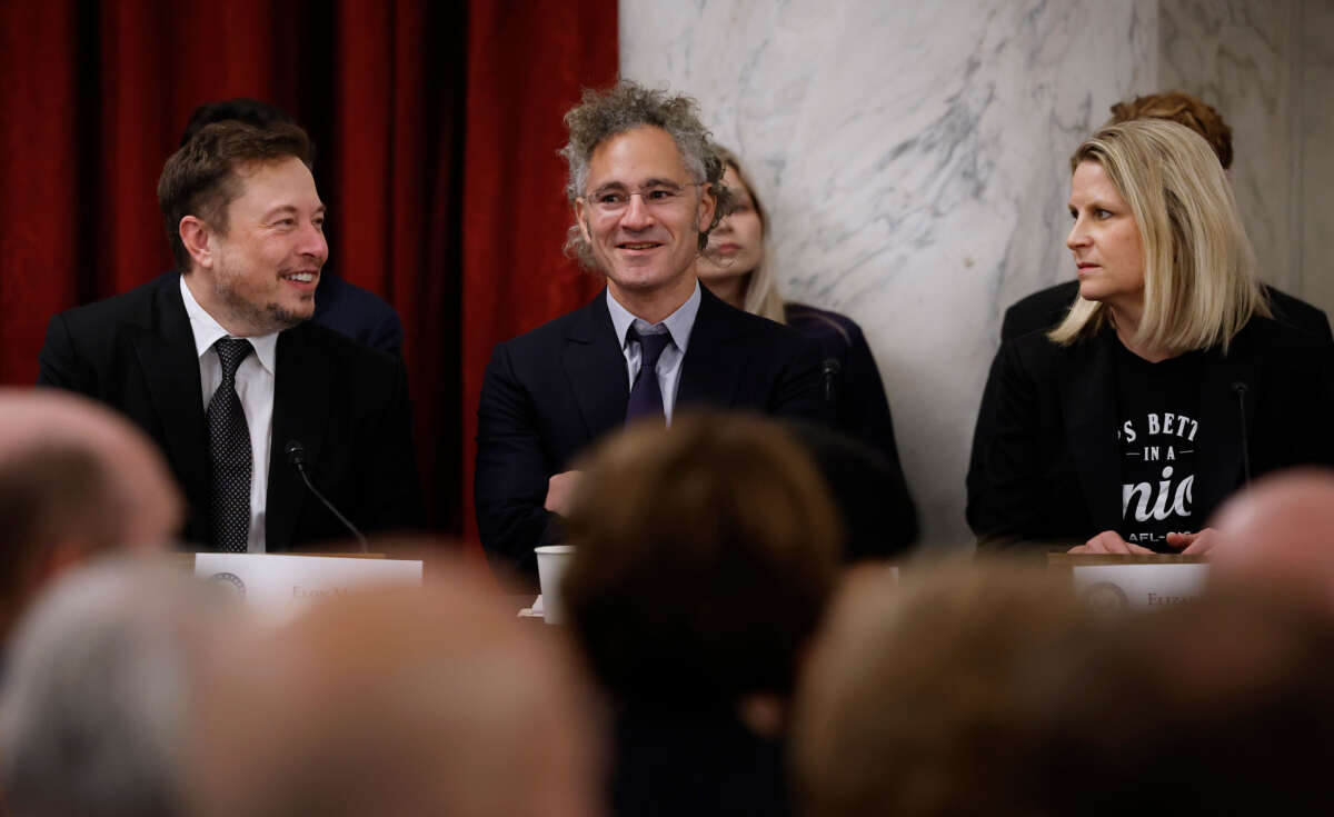 Elon Musk, Palantir CEO Alex Karp and AFL-CIO President Elizabeth Shuler attend the "AI Insight Forum" in the Kennedy Caucus Room in the Russell Senate Office Building on Capitol Hill on September 13, 2023, in Washington, D.C.