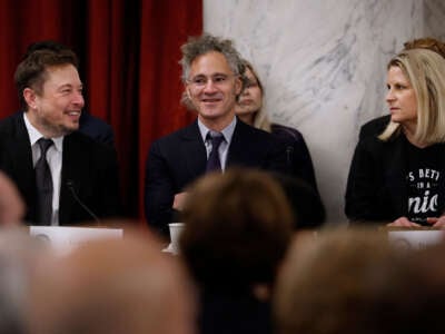 Elon Musk, Palantir CEO Alex Karp and AFL-CIO President Elizabeth Shuler attend the "AI Insight Forum" in the Kennedy Caucus Room in the Russell Senate Office Building on Capitol Hill on September 13, 2023, in Washington, D.C.