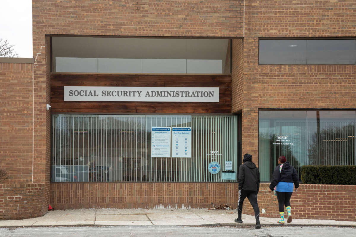 Two people enter a Social Security Administration office in suburban Detroit.