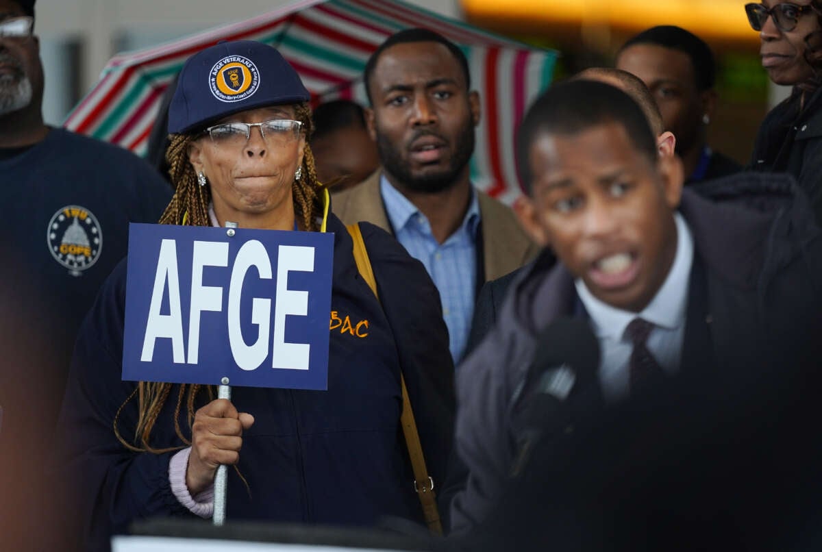 Roslyn Austin Stewart listens as the American Federation of Government Employees, the union that represents Transportation Safety Administration officers, holds a press conference in front of the Tom Bradley International Terminal at LAX in Los Angeles on January 16, 2019.