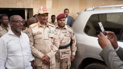 Gen. Mohamed Hamdan Dagalo "Hemeti," then the deputy head of the military council, visits patients at the Royal Care Hospital on May 4, 2019, in Khartoum, Sudan. Dagalo is now the head of the paramilitary Rapid Support Forces.