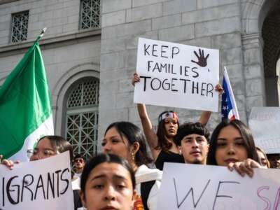 Students walk out of class in protest of Donald Trump's immigration policies on February 4, 2025, at Los Angeles City Hall.