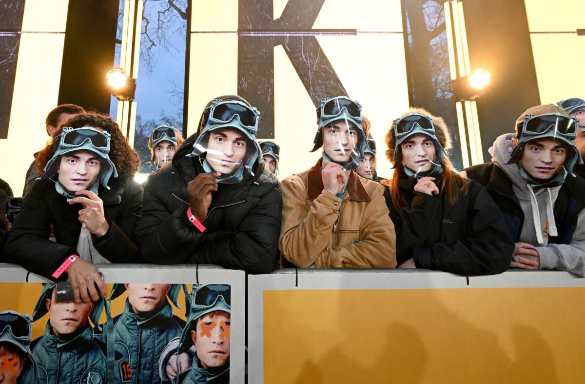 A general view of the audience wearing Robert Pattinson masks at the Mickey 17 World Premiere at Cineworld Leicester Square on February 13, 2025, in London, England.