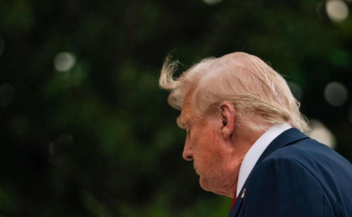 President Donald Trump walks on the South Lawn upon arrival at the White House in Washington, D.C., on July 13, 2025, after attending the 2025 FIFA Club World Cup final in New Jersey.