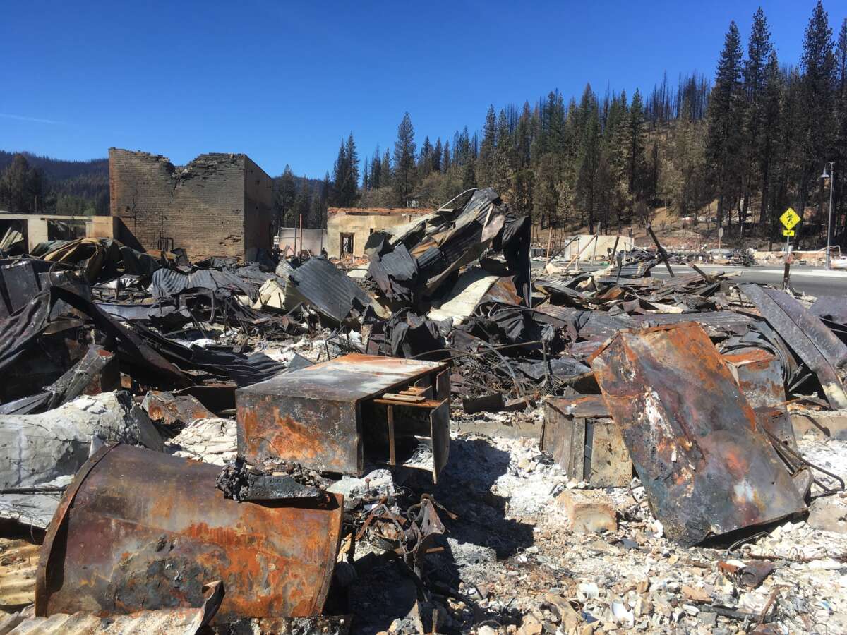 Rubble covers downtown Greenville, California, in August 2021, after the Dixie Fire burned the town.