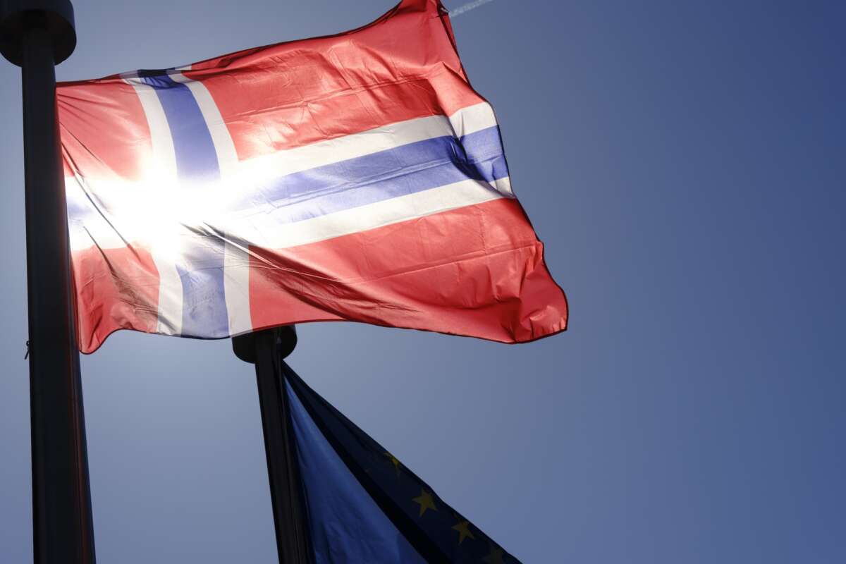 The Flag of Norway and the EU are seen in front of the Berlaymont, the EU Commission headquarter on April 7, 2025 in Brussels, Belgium.